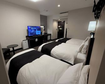 Apa Hotel Kokura Ekimae - Kitakyushu - Bedroom
