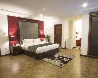 Oban Hotel - Лахор - Спальня