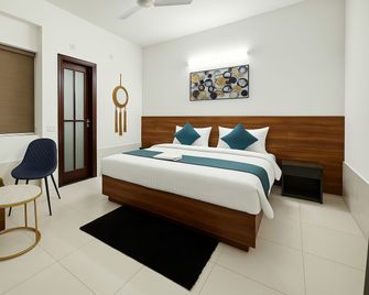 The Swarnim Hotel And Banquet - Noida - Schlafzimmer