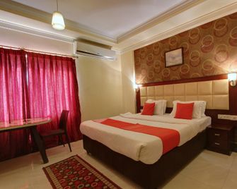 Capital O 6773 Ananya Comfortss - Hosapete - Bedroom