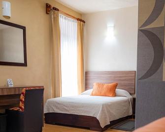 هوتل إستيفانيا - موريليا - غرفة نوم