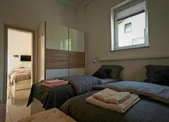 Apartments Drevi - Ljubljana - Yatak Odası