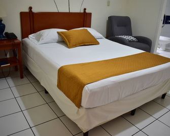 Hotel Villa Serena San Benito - San Salvador - Bedroom