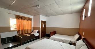 Hotel Alpachaca - Tababela - Schlafzimmer