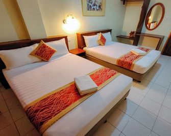 Virgo Batik Resort Teluk Batik Lumut - Lumut - Habitación