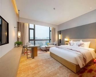 Huake Xinyi Hotel - Zhuzhou - Спальня