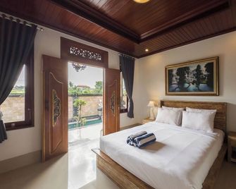 Tiara Guest House Ubud - Ubud - Sypialnia