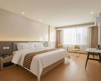 Jincheng Hotel - Linyi - Bedroom