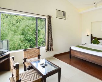 Treebo Aroma Park - Dhikuli - Schlafzimmer