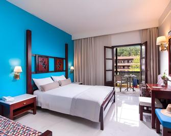 Simantro Resort - Sane - Bedroom