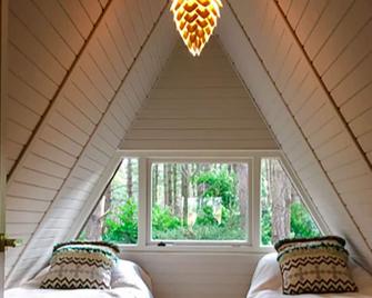 Pet-friendly Scandinavian A-Frame woodland retreat on the North Norfolk coast! - Holt