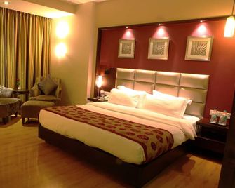 Lords Plaza Surat - Surat - Schlafzimmer