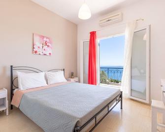 Katerina Horizon Apartments by Konnect - 1,8km from Ipsos beach - Ipsos - Camera da letto