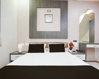 Collection O Sachivalay Gandhinagar Hotel Ghunghat - Gandhinagar - Schlafzimmer