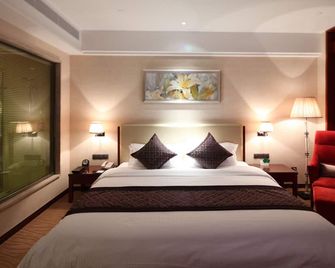 Wuhan Tianchimel Hotel - Wuhan - Camera da letto