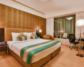 T24 Residency Mumbai International Airport Hotel - מומבאי - חדר שינה