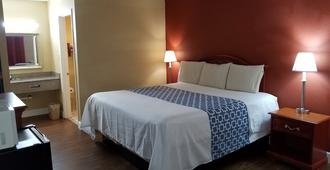 Econo Inn - Ormond Beach - Bedroom