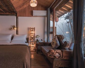 Day Boutique Hostel - Lijiang - Bedroom