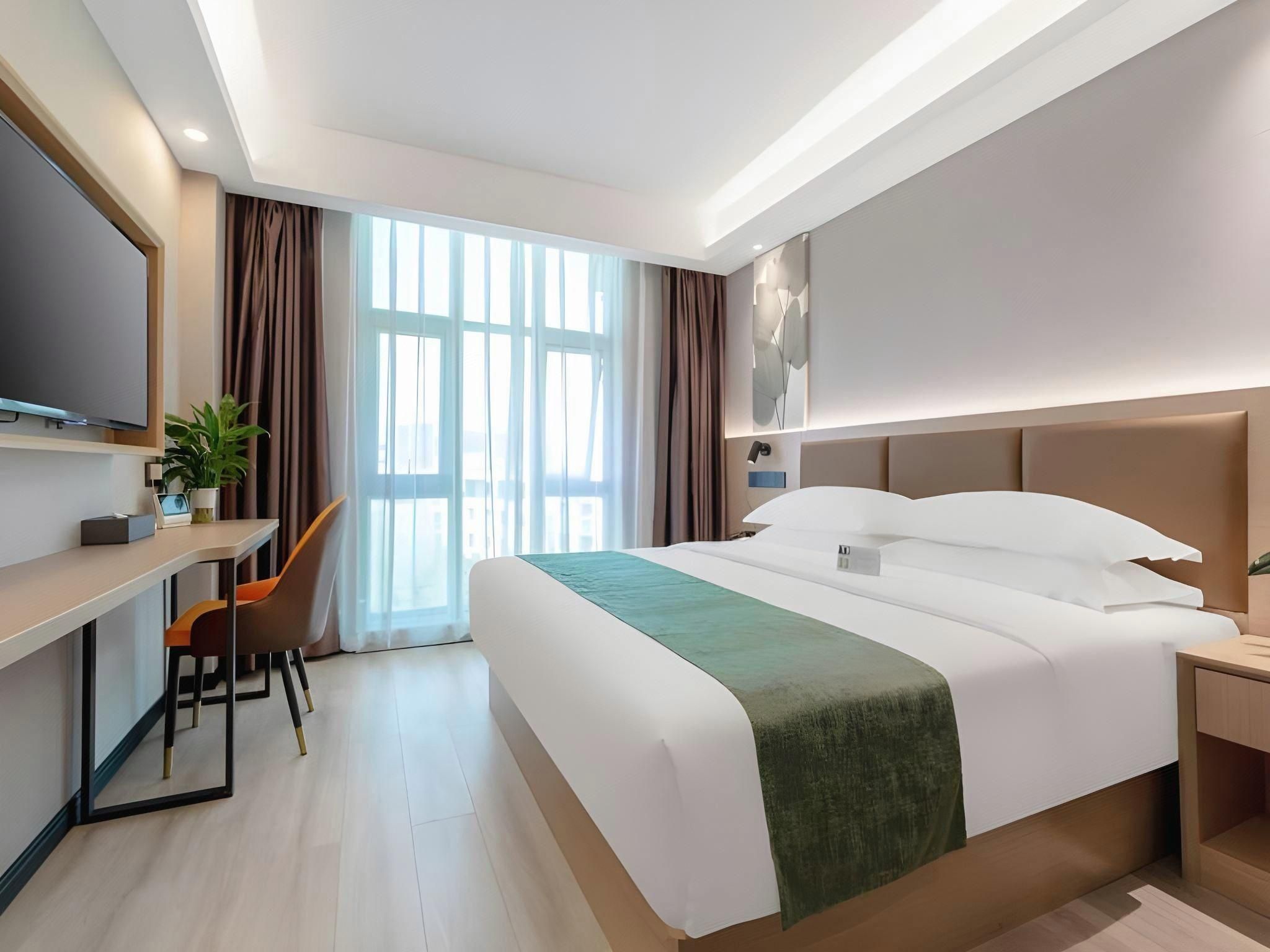 Green Tree Inn Yunnan Kunming Tongde Plaza Wanhong Road - קונמינג - חדר שינה