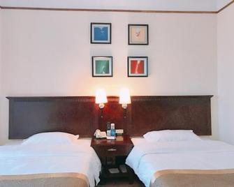 Foshan Jinjia Hotel - Foshan - Bedroom