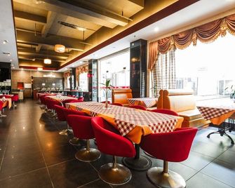 Hang Seng Business Hotel Dongguan (Huayang Lake) - Dongguan - Restaurante