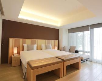 Ispavita B&b Resort - Jiaoxi - Schlafzimmer