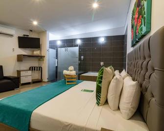 ليراس جرين هوتل - ميديلين - غرفة نوم