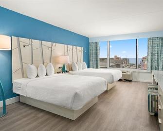 فينويك إن - أوشن ستي - غرفة نوم