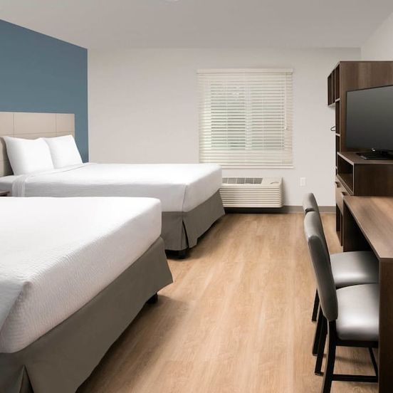 Bedroom view of Woodspring Suites Broken Arrow