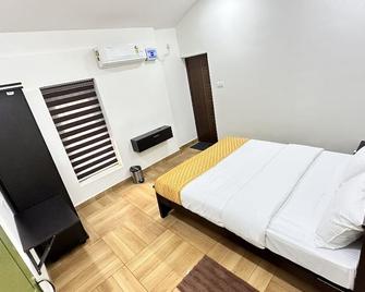 Better Inn Ac Villa Kovalam - Kovalam - Schlafzimmer