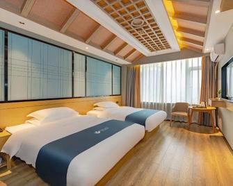 Yibin Grand Hotel - Yibin - Schlafzimmer