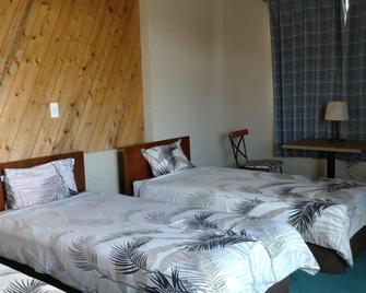 Minshuku Seaside House Dugong - Kumejima - Slaapkamer