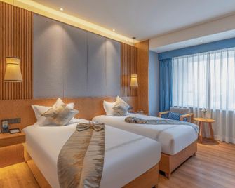 Kunming Manyan·V Hotel (Kunming Gymnasium Yunda Hospital) - Kunming - Bedroom