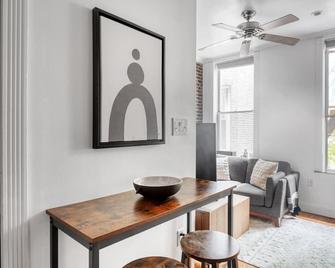 Sleek Nolita 1BR w/ W/D, nr SoHo, by Blueground - New York - Living room