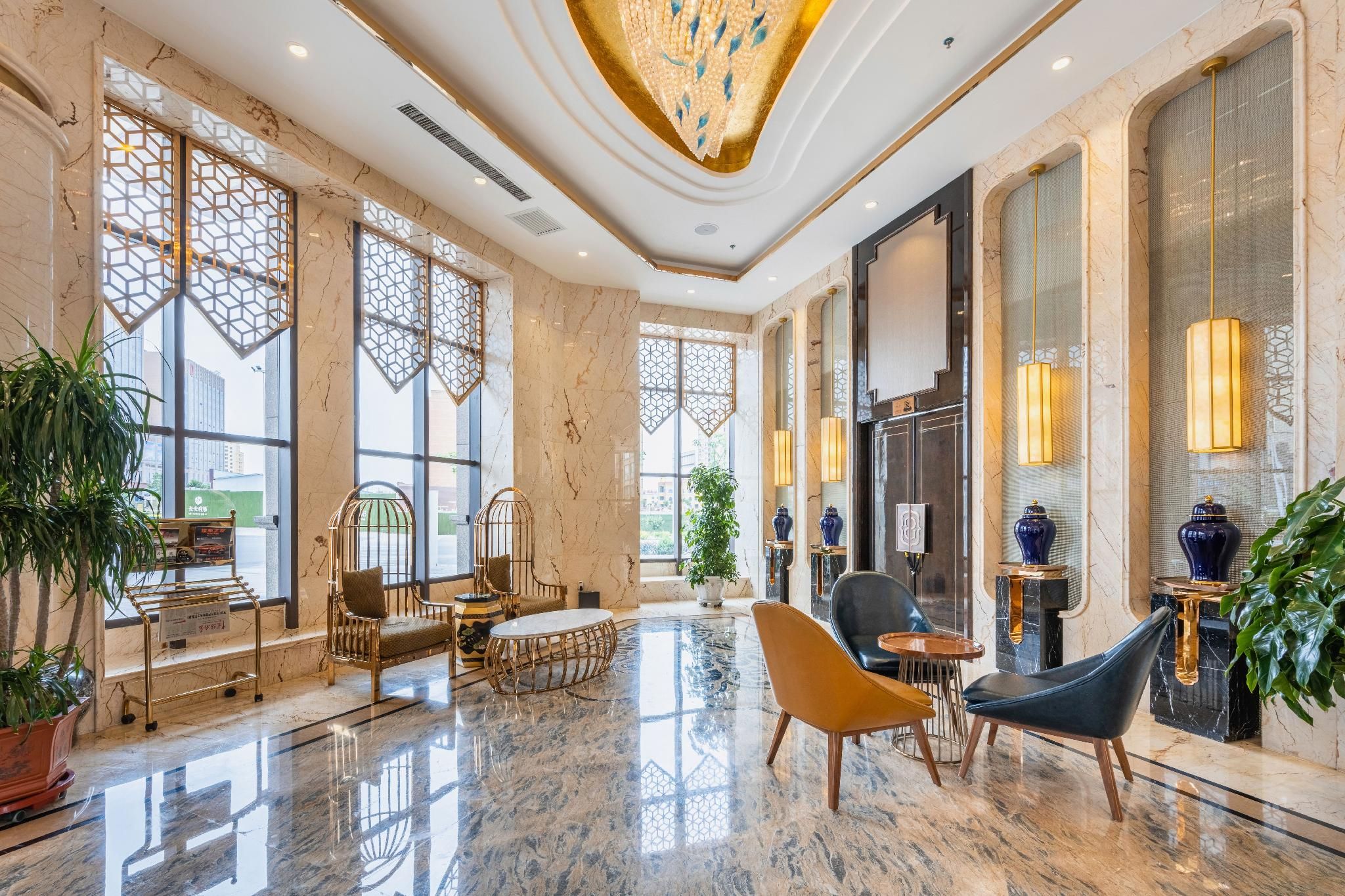 Zhangye Ducheng Holiday Hotel - تشانغيه - ردهة