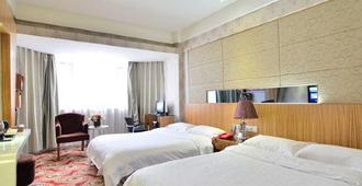 Jinlong City Hotel (Wuzhou Sun Plaza) - Wuzhou - Bedroom