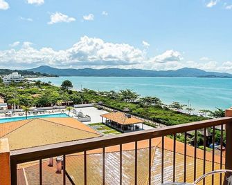 Estúdios Modernos em Resort pé na areia - Jurerê Beach Village JBVJR - Florianópolis - Varanda