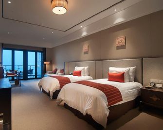 Jingtian Hotel (Zhangzhou Backgammon New World) - Luzhou - Habitación