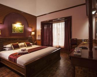 جيه سي ريزيدنسي - كودايكانال - غرفة نوم