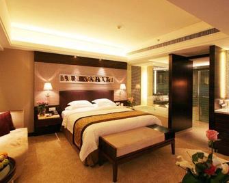 Luxemon Xinjiang Yindu Hotel - אורומצ'י - חדר שינה