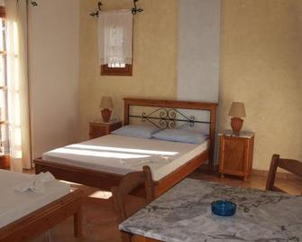 Ligaries - Kini - Habitación