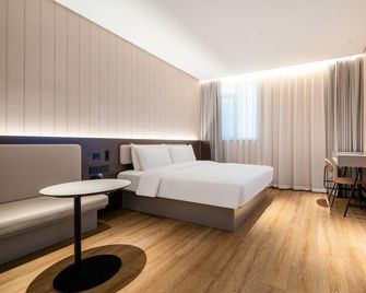 Hanting Hotel Qingdao North Station Branch 2 - 칭다오 - 침실