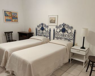 House 'Il Glicine', Maison de Charme - Orosei - Schlafzimmer