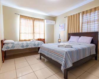 Colinas Del Atlantico 2 floors - Isabela - Habitación