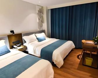 Greentree Rizhao Lanshan Coach Station Hotel - Rizhao - Ložnice