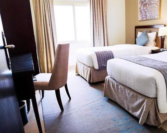 Tulip Inn - Taskeen Served Apartment - Dammam - Bedroom