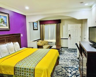 Scottish Inn and Suites Alvin - Alvin - Slaapkamer