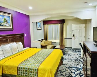Scottish Inn and Suites Alvin - Alvin - Makuuhuone