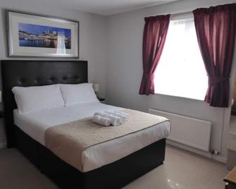 Capri Guest House - Torquay - Bedroom