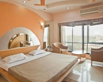 Hotel Kaveri International - Porbandar - Bedroom